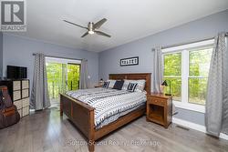 Secondary Res Primary Bedroom with view to Lake - 