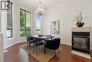 1544 Imperial Crescent, Windsor, ON  - Indoor Photo Showing Dining Room With Fireplace 