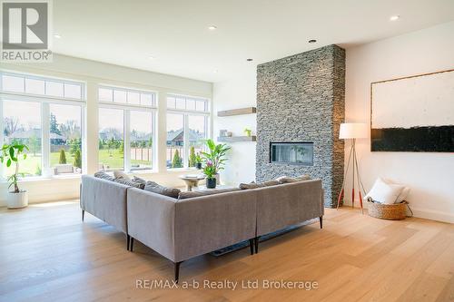 60 August Crescent, Norwich (Otterville), ON - Indoor Photo Showing Living Room With Fireplace