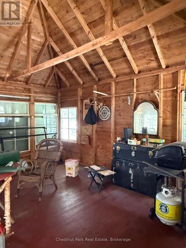 Winter. Piers are stone & log/wood - 17 Whitefish Lake Apl1582, Algonquin Highlands (Lawrence), ON - Indoor Photo Showing Other Room