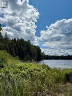 To the south. No neighbours for hundreds of feet - 