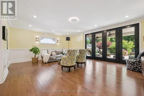 12 ft of custom doors and glass . - 33 Edgehill Drive, Guelph (Exhibition Park), ON - Indoor Photo Showing Living Room