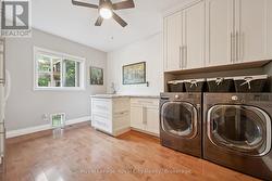 Main floor laundry and storage hub-2nd fridge area - 
