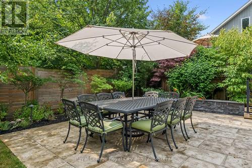 8ft privacy fence mature lush gardens - 33 Edgehill Drive, Guelph (Exhibition Park), ON - Outdoor With Deck Patio Veranda