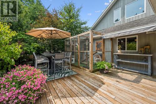 12x8 catio - retractable awning over food serving - 33 Edgehill Drive, Guelph (Exhibition Park), ON - Outdoor With Deck Patio Veranda With Exterior