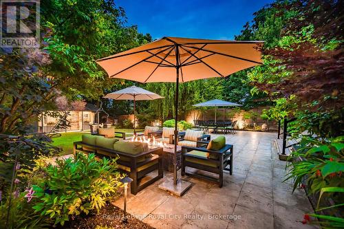 Custom made, this fire table has its own gas line. - 33 Edgehill Drive, Guelph (Exhibition Park), ON - Outdoor With Deck Patio Veranda