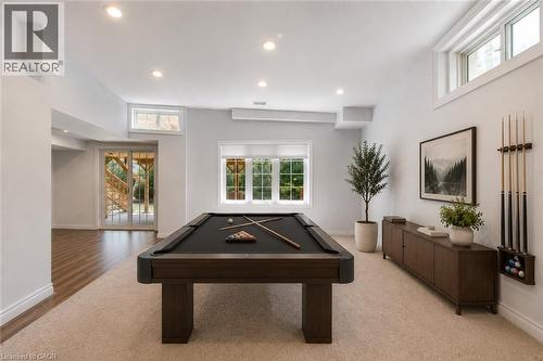 Recreation room featuring a dark wood pool table, recessed lighting, and a combination of carpet and wood-finish flooring - 2380 Woodcrest Drive, Oakville, ON - Indoor Photo Showing Other Room
