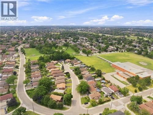 Aerial perspective of a residential neighborhood featuring numerous detached homes with established landscaping - 15 Quay Court, Hamilton, ON - Outdoor With View