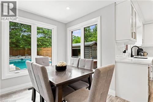 Bright dining area with light wood-finish flooring and recessed lighting - 10 Rolling Acres Drive, Kitchener, ON - Indoor Photo Showing Dining Room