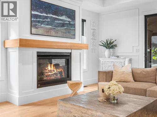 293 Xavier Circle, Lakeshore, ON - Indoor Photo Showing Living Room With Fireplace