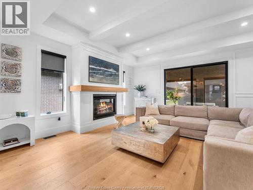 293 Xavier Circle, Lakeshore, ON - Indoor Photo Showing Living Room With Fireplace