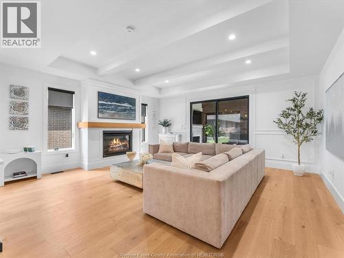 293 Xavier Circle, Lakeshore, ON - Indoor Photo Showing Living Room With Fireplace