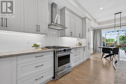 Gas stove with abundant drawers and cabinetry. - 10 B Brigade Avenue, Ottawa, ON - Indoor Photo Showing Kitchen With Upgraded Kitchen