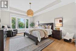 Coffered ceiling in primary bedroom - 