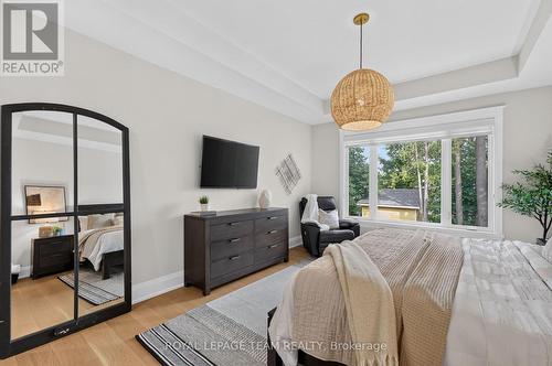 Large windows for view of private treed backyard - 10 B Brigade Avenue, Ottawa, ON - Indoor Photo Showing Bedroom
