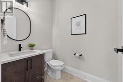 Main floor 2pc powder room - 