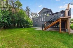 Ease of backyard with grand staircase - 