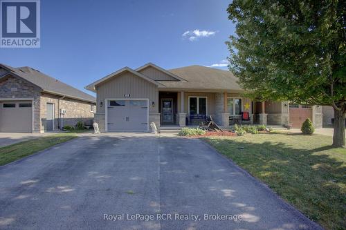 105 Milton Seiler Crescent, Minto, ON - Outdoor With Deck Patio Veranda With Facade