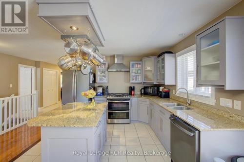 105 Milton Seiler Crescent, Minto, ON - Indoor Photo Showing Kitchen With Double Sink