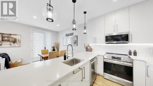107 - 175 Doan Drive, Middlesex Centre (Kilworth), ON - Indoor Photo Showing Kitchen With Upgraded Kitchen