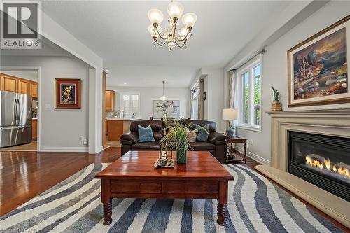3368 Raspberry Bush Trail, Oakville, ON - Indoor Photo Showing Living Room With Fireplace