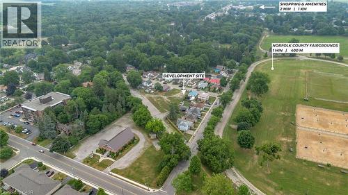 Aerial perspective showcasing a development site surrounded by mature trees - 7 James Street, Simcoe, ON 