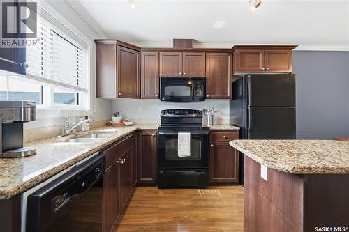 317 315 Hampton Circle, Saskatoon, SK - Indoor Photo Showing Kitchen With Double Sink