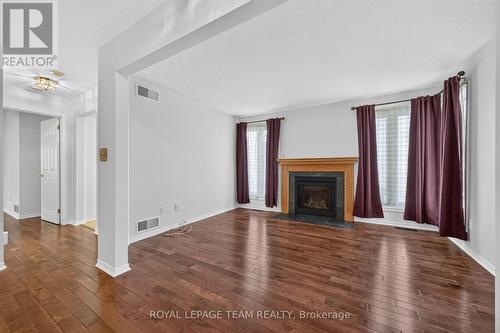 35 Billingham Crescent, Ottawa, ON - Indoor Photo Showing Living Room With Fireplace