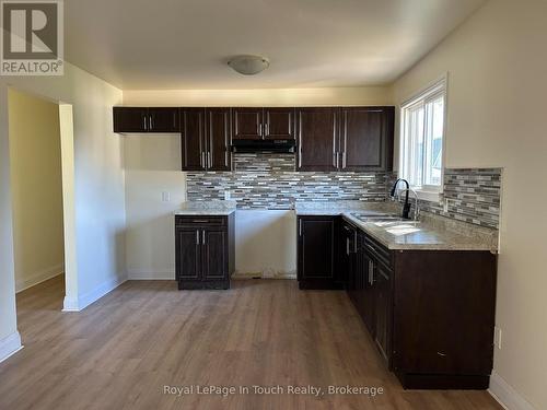 317 Wardell Street, Tay (Port Mcnicoll), ON - Indoor Photo Showing Kitchen With Double Sink