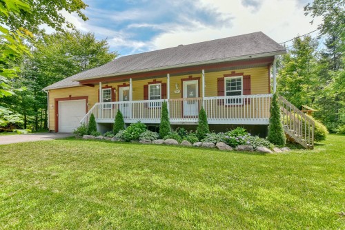 Front of Structure - 713 Rue Boivin, Sainte-Sophie, QC - Outdoor With Deck Patio Veranda