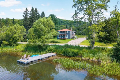 Front of Structure - 215  - 217 Ch. Paquette, Mont-Tremblant, QC - Outdoor With Body Of Water With View