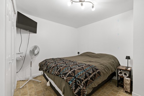 Dwelling - 215  - 217 Ch. Paquette, Mont-Tremblant, QC - Indoor Photo Showing Bedroom