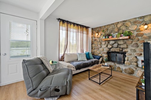 Dwelling - 215  - 217 Ch. Paquette, Mont-Tremblant, QC - Indoor Photo Showing Living Room With Fireplace