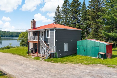 Front of Structure - 215  - 217 Ch. Paquette, Mont-Tremblant, QC - Outdoor With Body Of Water