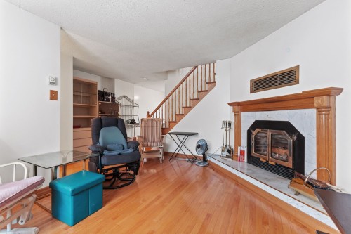 Salon - 14 Rue Du Ravin-Bleu, Gatineau (Hull), QC - Indoor With Fireplace