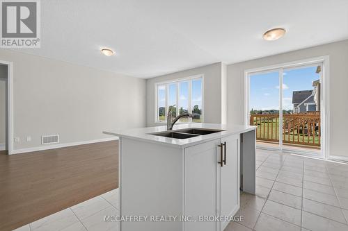 19 Oakmont Drive, Loyalist (Bath), ON - Indoor Photo Showing Kitchen With Double Sink