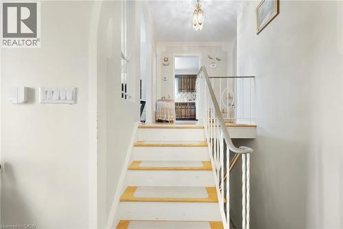 STEPS TO MAIN FLOOR OF HOME - 591 Mohawk Road W, Hamilton, ON - Indoor Photo Showing Other Room