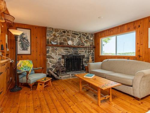 390-406 Highway 308, Morris Island, NS - Indoor Photo Showing Living Room With Fireplace
