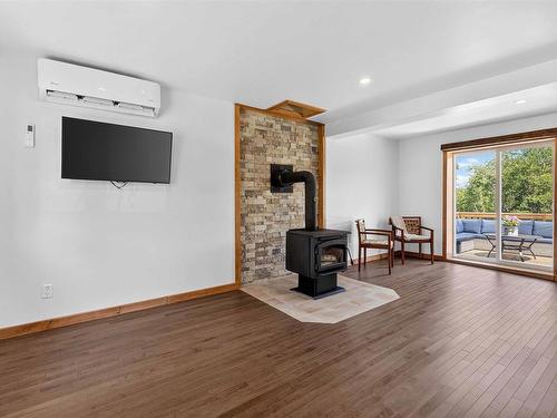 1959 Highway 208, Hemford, NS - Indoor Photo Showing Living Room With Fireplace