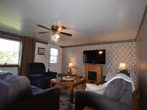 4540 Highway 2, Upper Economy, NS - Indoor Photo Showing Living Room With Fireplace