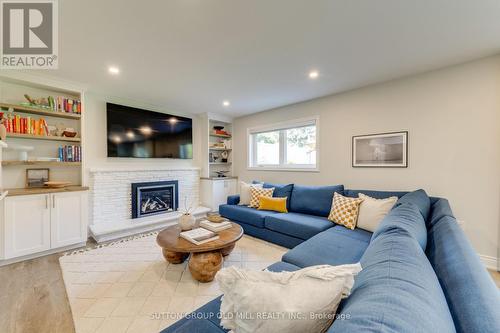 Ground floor family room w. walk-out to yard - 85 Bonnyview Drive, Toronto, ON - Indoor Photo Showing Living Room With Fireplace