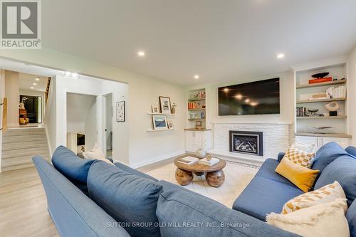 Ground floor family room w. walk-out to yard - 85 Bonnyview Drive, Toronto, ON - Indoor Photo Showing Living Room With Fireplace