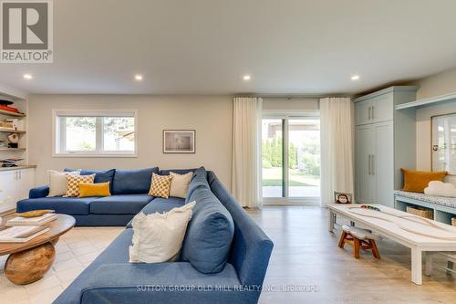 Ground floor family room with walk-out to yard - 85 Bonnyview Drive, Toronto, ON - Indoor Photo Showing Living Room