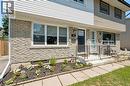 Exterior showcasing a stone facade and horizontal siding - 589 Elgin Street N, Cambridge, ON  - Outdoor 