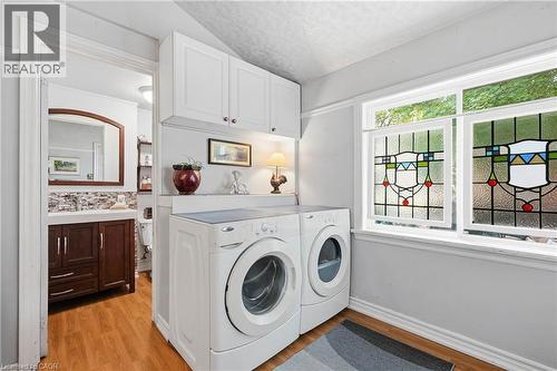 Laundry area featuring a window with decorative stained-glass inserts - 153 Montrose Street N, Cambridge, ON - Indoor Photo Showing Laundry Room