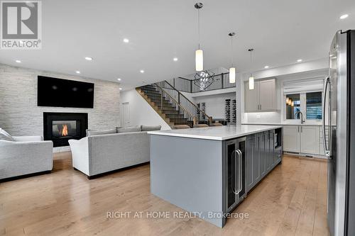 32 Edenbridge Court, Ottawa, ON - Indoor Photo Showing Other Room With Fireplace