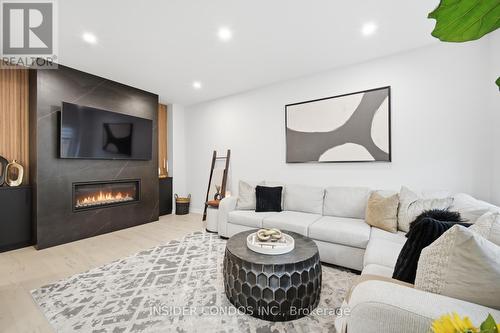 1521 Stovell Crescent, Innisfil, ON - Indoor Photo Showing Living Room With Fireplace