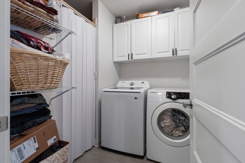 Salle de lavage - 002-848 Rue Valois, Vaudreuil-Dorion, QC - Indoor Photo Showing Laundry Room