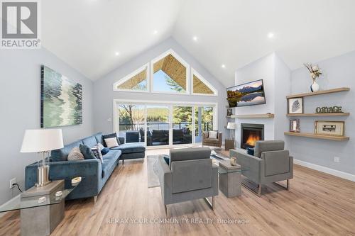 142 Bentley Lake Loop, Faraday, ON - Indoor Photo Showing Living Room With Fireplace