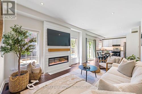 33 Dewsbury Way, Hamilton, ON - Indoor Photo Showing Living Room With Fireplace